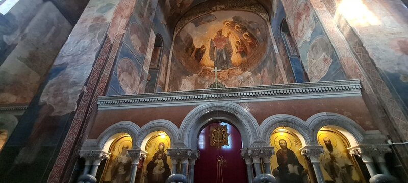 Ukrainian famous church of XII century. Cyril medieval church - today a museum. Scenic light in the dark. Heritage ancient and modern fresque on the walls.