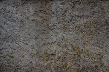 Close-up view of abstract rough dark gray stone rock background. Copy space for your text or decoraton. Natural textured backgrounds theme.