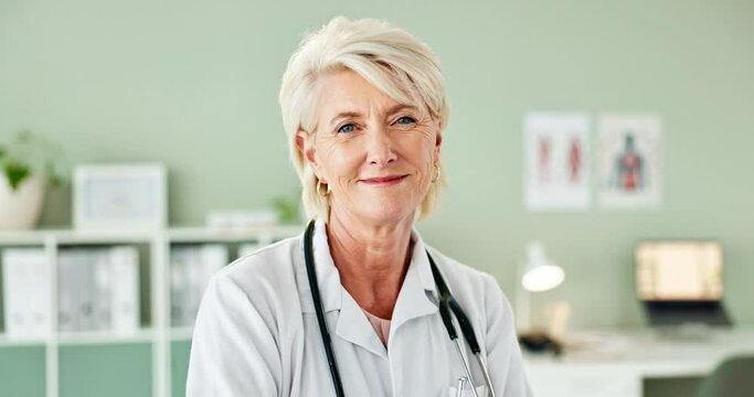 Smile, confident and face of senior doctor in office at hospital with pride for career. Happy, professional and portrait of mature woman healthcare worker with positive attitude in medical clinic.