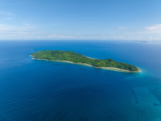 Cagbuli Island surrounded by blue sea. El Nido, Palawan. Philippines.