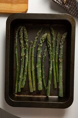 Overhead view of asparagus in baking dish