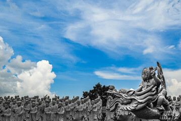 various statues photographed out of 500 statues of worshipers. A very scenic buddha temple in...