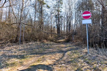 
The road sign to enter is blocked on the section of the forest road