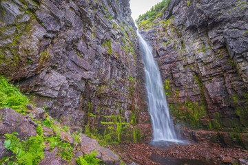 Fototapeta na wymiar Njupeskär is a waterfall in northwestern Dalarna, formed by Njupån in Fulufjällets nationalpark