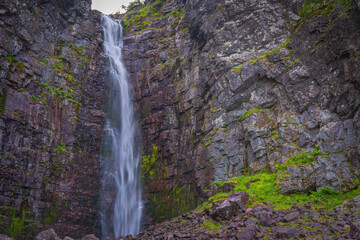 Njupeskär is a waterfall in northwestern Dalarna, formed by Njupån in Fulufjällets nationalpark - obrazy, fototapety, plakaty
