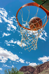 Basketball ball going through the net during a basketball tournament in Arizona