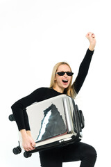 Pretty young woman with suitcase under her arm on white background. - 749943057
