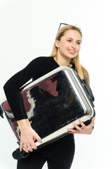Pretty young woman with suitcase under her arm on white background. - 749943071