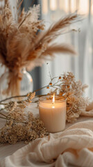 Obraz na płótnie Canvas Arranging candles on a table with flowers enhances the warmth and coziness of the atmosphere