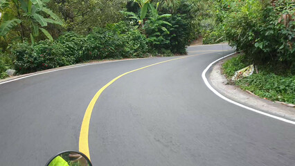 The highway divide from behind the wheel of a motorcycle