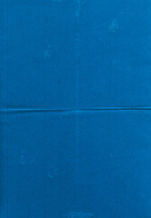 texture of blue folded toner paper, cool poster overlay via blend mode.
