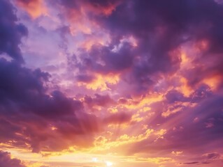 Time-lapse view of a stunning sunset over rolling hills, casting a pink hue across the sky