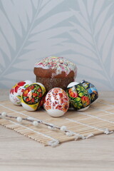 Easter, brightly colored Easter eggs and Easter cake. Celebration traditions