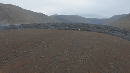 View of cracked lava crust or ingenious rock and steam cooled down from the 2021 eruption of...