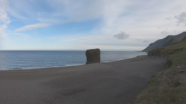 Stapinn sea stack at Stapav&iacute;k is a unique part of the stunning coast south of &Aacute;lftafj&shy;&ouml;r&eth;ur in Iceland.