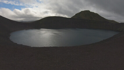 Blahylur lake, spelled Bláhylur in Icelandic and also known as Hnausapollur, is a stunning crater...