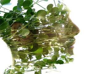 A double exposure profile portrait with a transparency effect