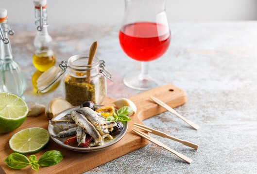 anchovy appetizer with olives.