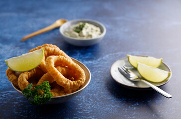 Homemade calamari with tartar sauce.