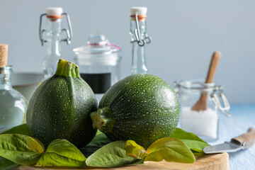 Fresh ball zucchini on a table top.