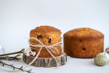 Small Easter pies, quail eggs, Easter cake set with raisins, spring holidays