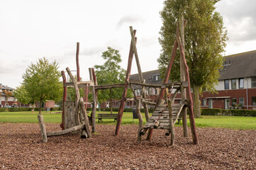 Rustic Wooden Playground in Suburban Park
