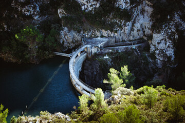 Dam wall in Barrage de Bimont near Aix en Provence and Saint Victoire mountain