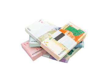 Different denominations of Pakistani banknotes bundles on white isolated background