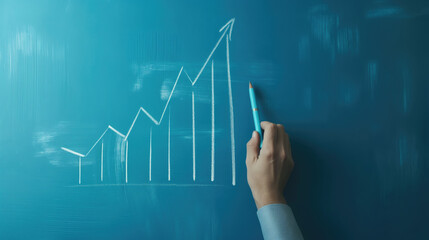 Businessman draw growth graph and progress of business.