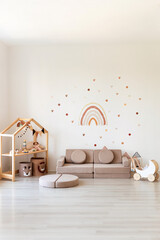 Kids room interior in contemporary, Scandinavian style. Wooden bed, sofa and toys. Cozy room for child. - 749984603