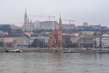 Budapest, Hungary. View over Danube River on Parliament Building, Buda Castle and Matthias Church.
