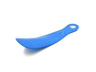 Photo of a blue plastic shoehorn, isolated on white background.