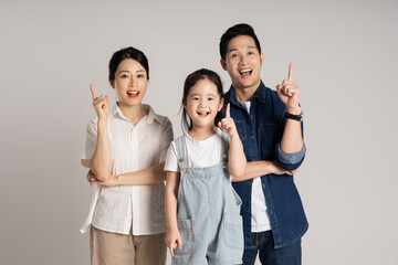 Asian family portrait posing on white background