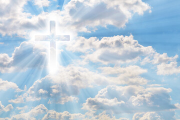 Easter illustration with a shining cross and lightbeam on blue defocused cloudy sky.