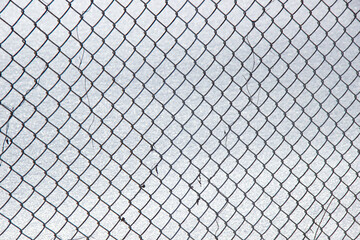 Fototapeta premium Mesh fence photo in winter.