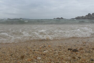 sea currents sand beach stones cliffs waves summer vacation