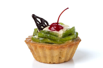 Colorful fruit cake made with kiwi, candied cherry and chocolate isolated on white background.