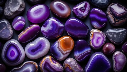 Obraz na płótnie Canvas Smooth polished purple agate stones background