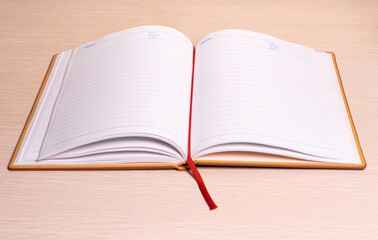 Opened book on a desk. After some edits.