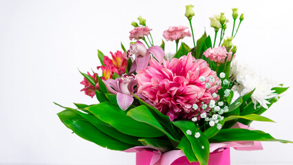Big beautiful bouquet of  various natural flowers close up. White background.