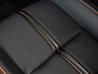 Part of leather car headrest seat details. Сlose-up black   perforated leather car seat. Skin...