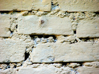 Closeup of a damaged brick wall