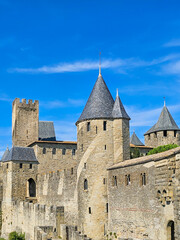Fototapeta na wymiar Towers of the medieval citadel of Carcassonne city in southern France UNESCO World Heritage Site