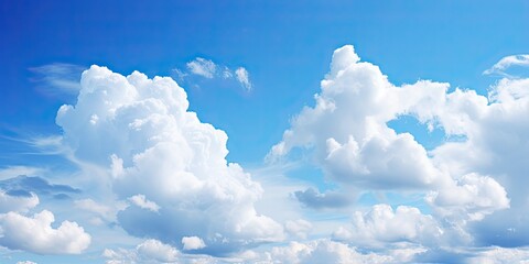 Naklejka na ściany i meble Serene Blue Clouds in the Sky. Peaceful and Beautifully Captured Scenic Cloudscape Wallpaper for a Summer Day with White Clouds in Nature