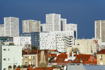 Towers of the 13th arrondissement of Paris city  and roofs of old buildings  in Ivry-sur-Seine city - obrazy, fototapety, plakaty