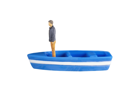 generic no brand toy of a miniature man in casual attire standing in a boat. isolated transparent png