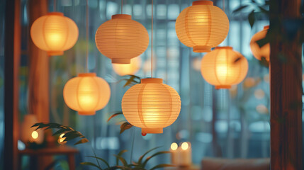 A cluster of paper lanterns suspended from the ceiling, casting a soft, diffused light that bathes the room in a tranquil glow. - Powered by Adobe