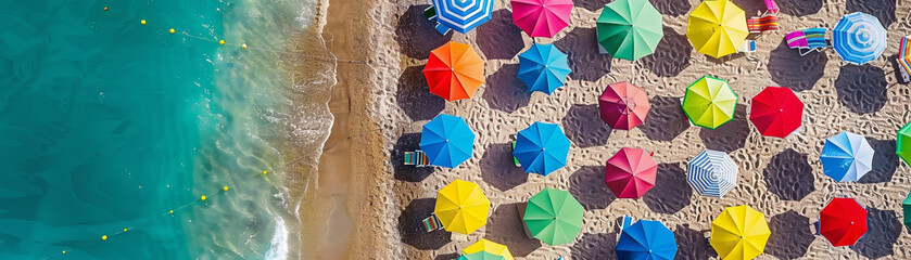 Colorful Beach Umbrellas from Aerial View