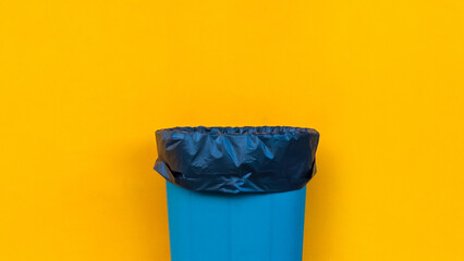 Garbage bin on yellow background, Ecological concept Reduce, reuse, recycle, ecological metaphor...