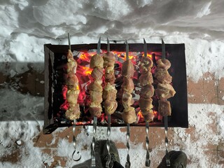 pork shish kebab on charcoal